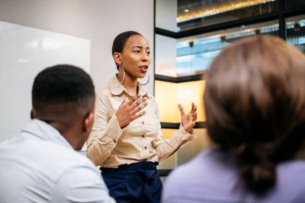 A financial advisor presenting to clients